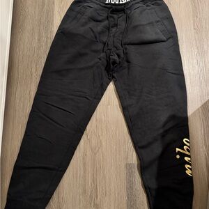 Nike Black Joggers with Gold & Silver shoes Detail